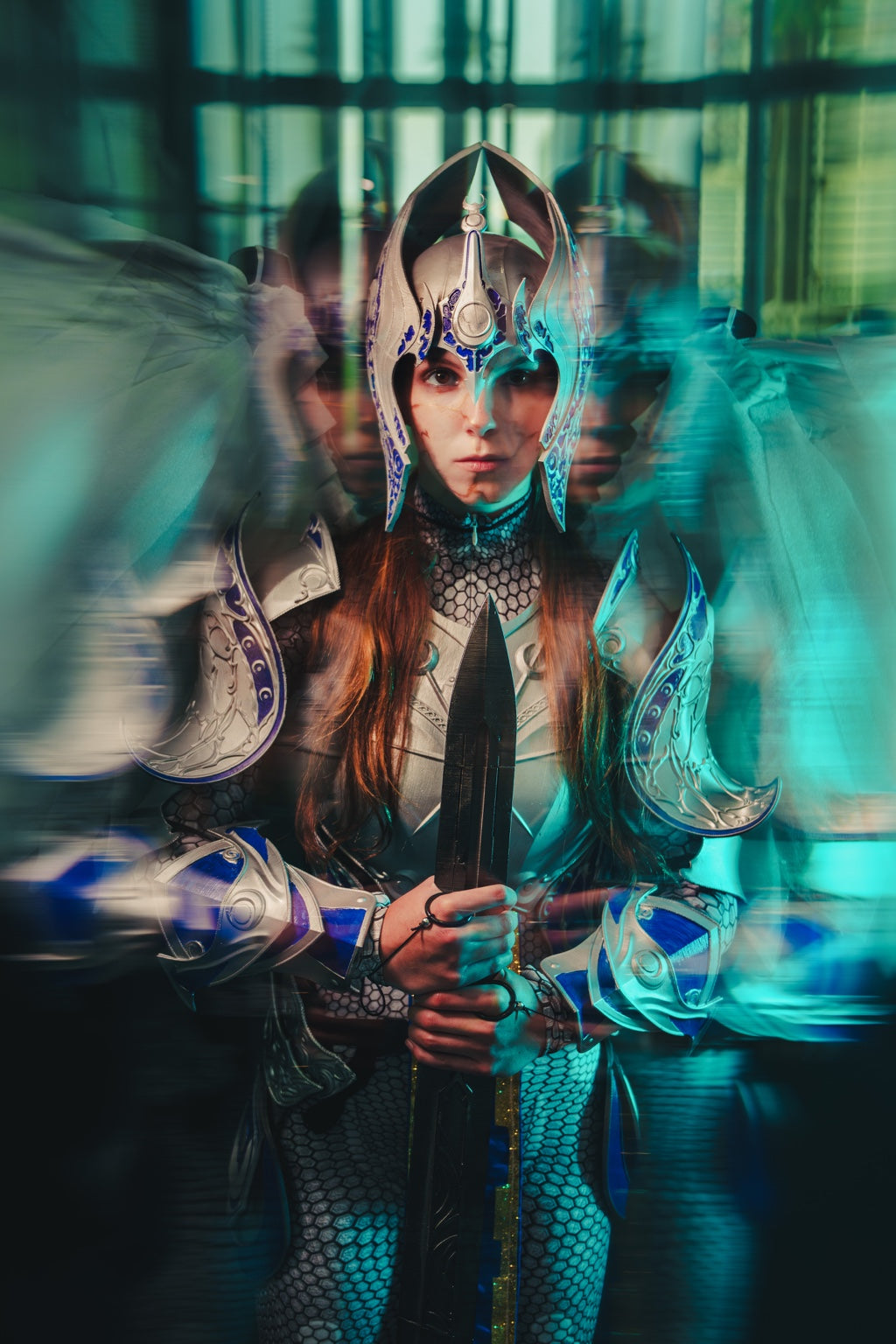 Cosplayer in an ornate headpiece and armor in a teal-lit fantasy portrait